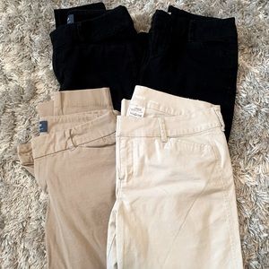Old Navy Pixie style dress pants. Size 6 regular. 4 pair. 2 khaki, 2 black.